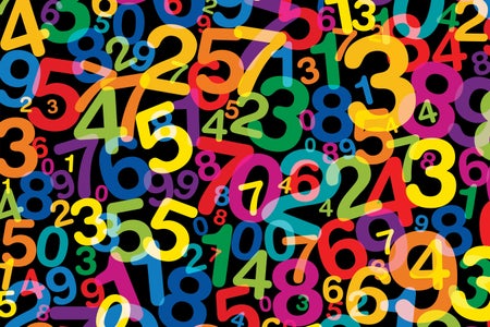 Jumbled, twisted and randomly distributed numerals from 1 to 0 in different sizes and angles and rainbow colors numbers over black background.