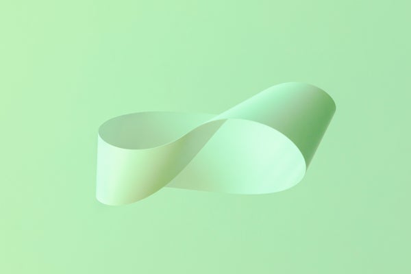 Mobius strip soaring in the air on mint background