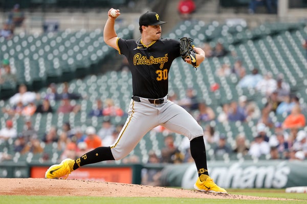 Paul Skenes throwing a pitch